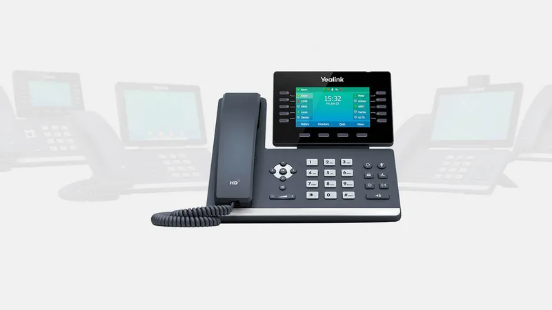 Yealink T54W business phone, with other Yealink T5 series phones behind it