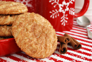 snickerdoodle cookies with cinnamon sticks and snowflake mug