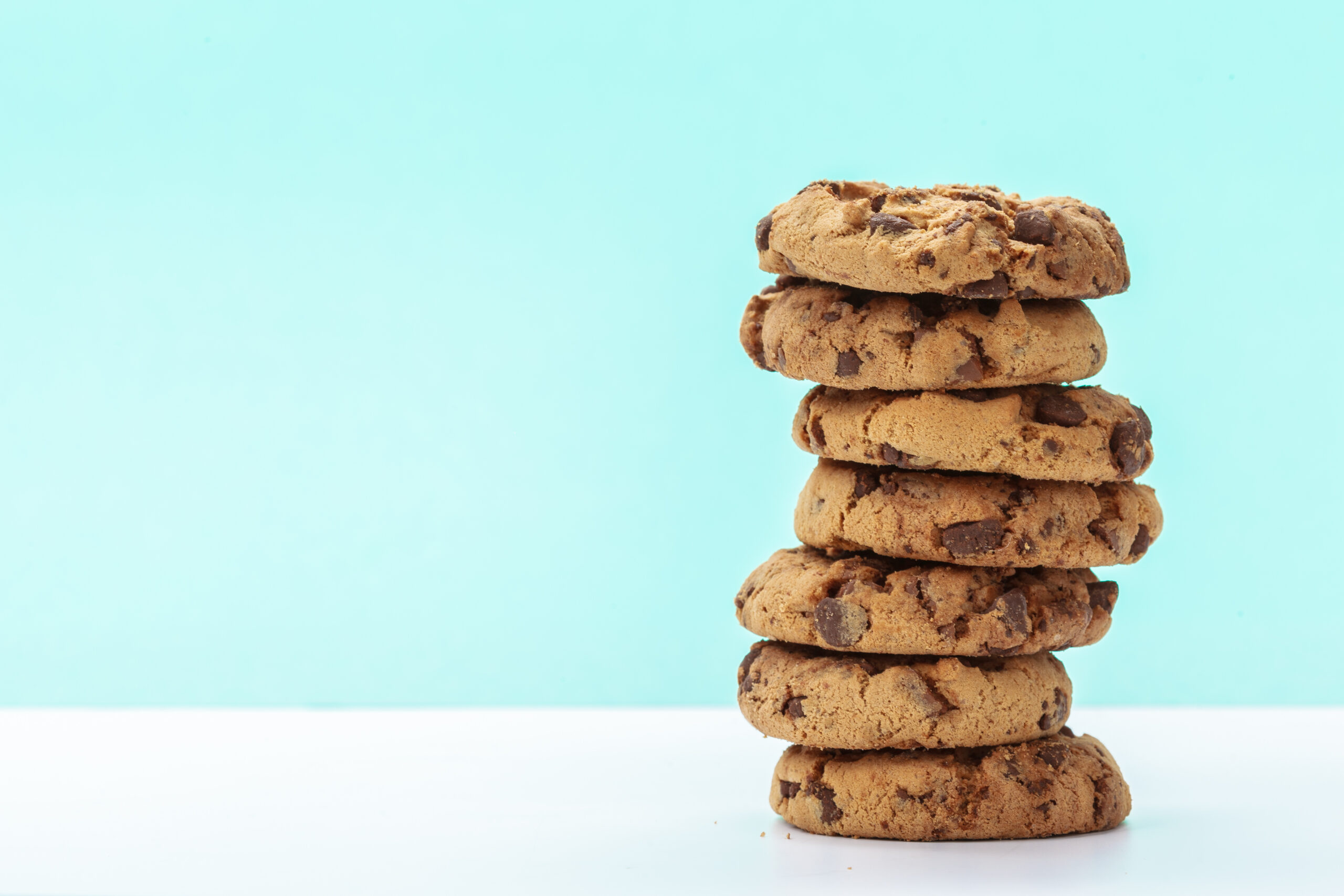 chocolate chip cookies on a bright blue background