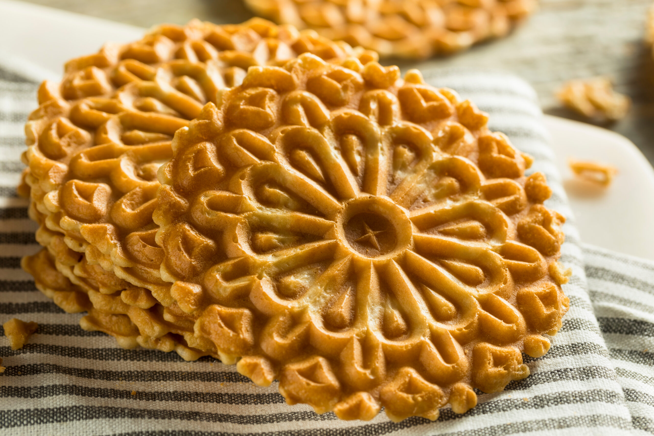a pile of Pizzelle cookies
